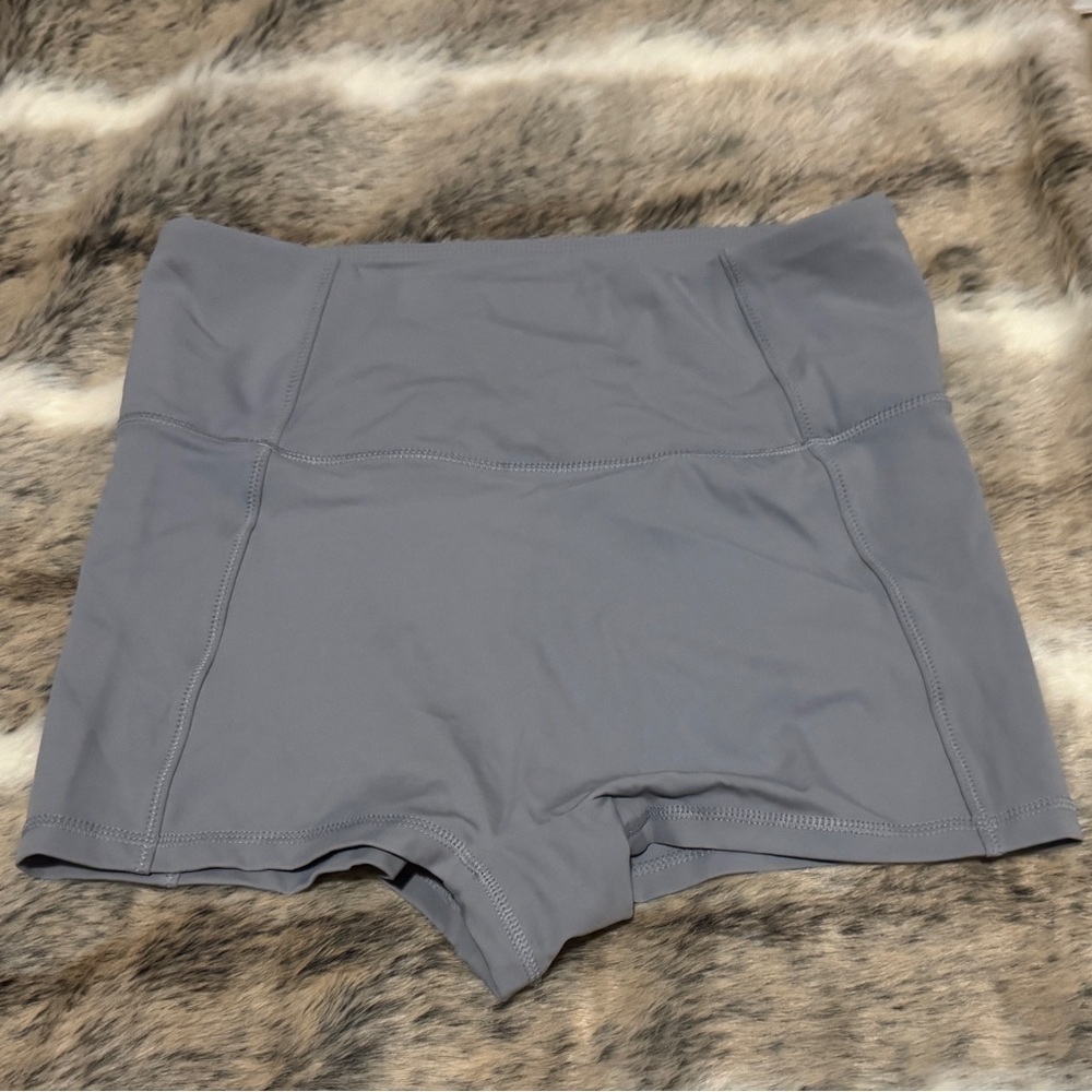 NWOT Fabletics high-waisted swim shorts in a gray or "Raincloud" color Size Med